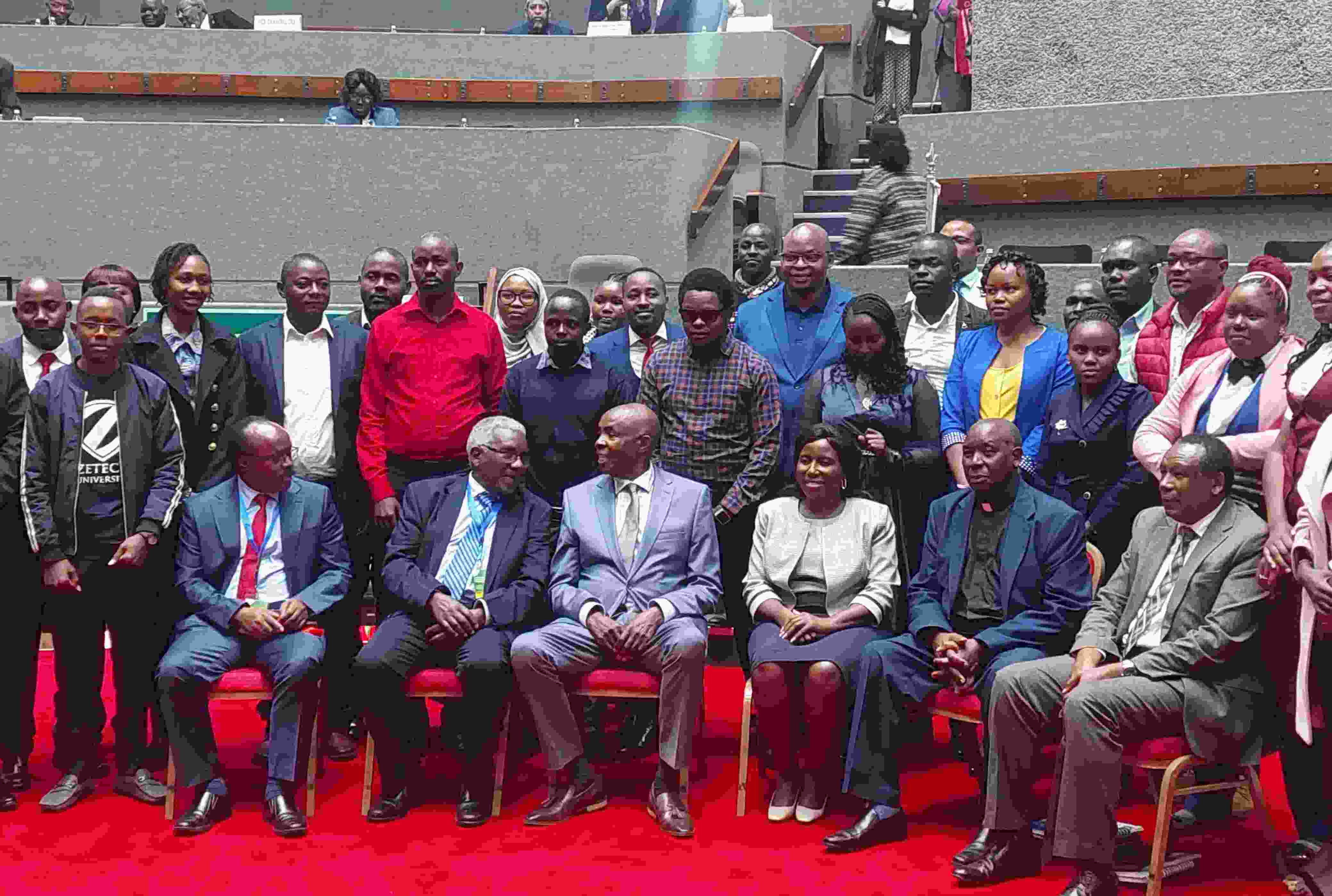 A picture of Masaki in a congregation with the Minister of Education of that time.